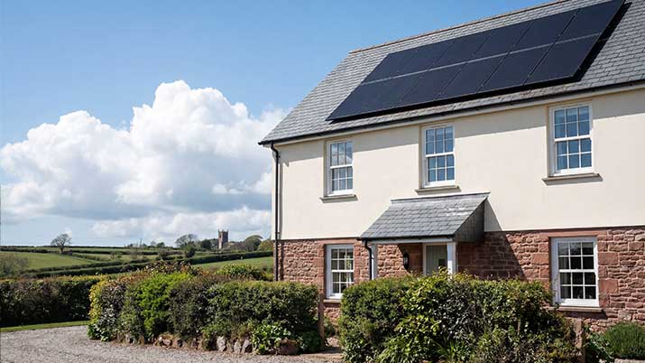 Roof-level detail showing panel layout and spacing on a Devon property