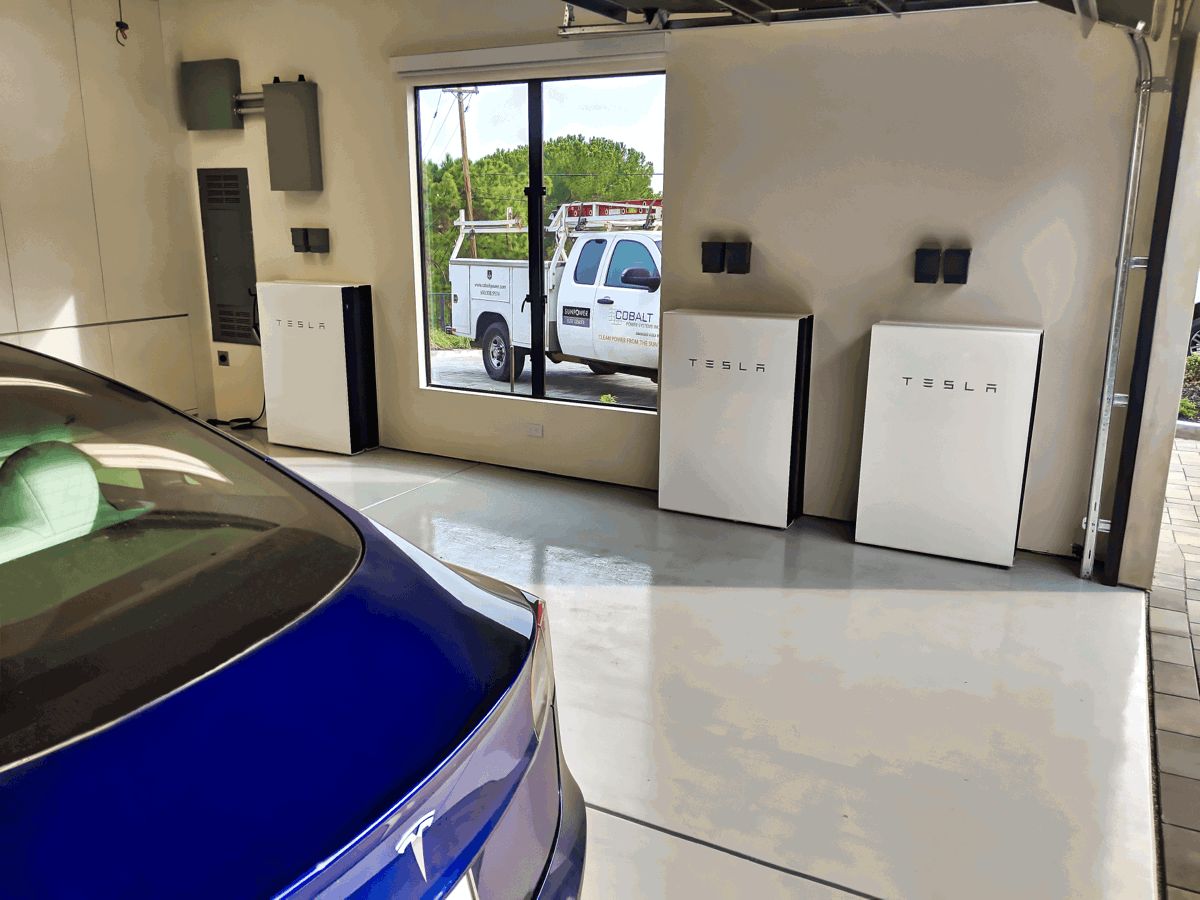 Tesla battery storage installation in a garage